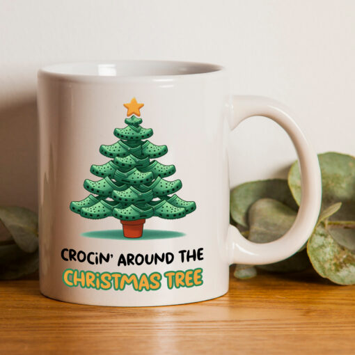 The perfect mug for a croc addict. It has the words "Crocin' Around The Christmas Tree" and an image of a Christmas tree made from crocs